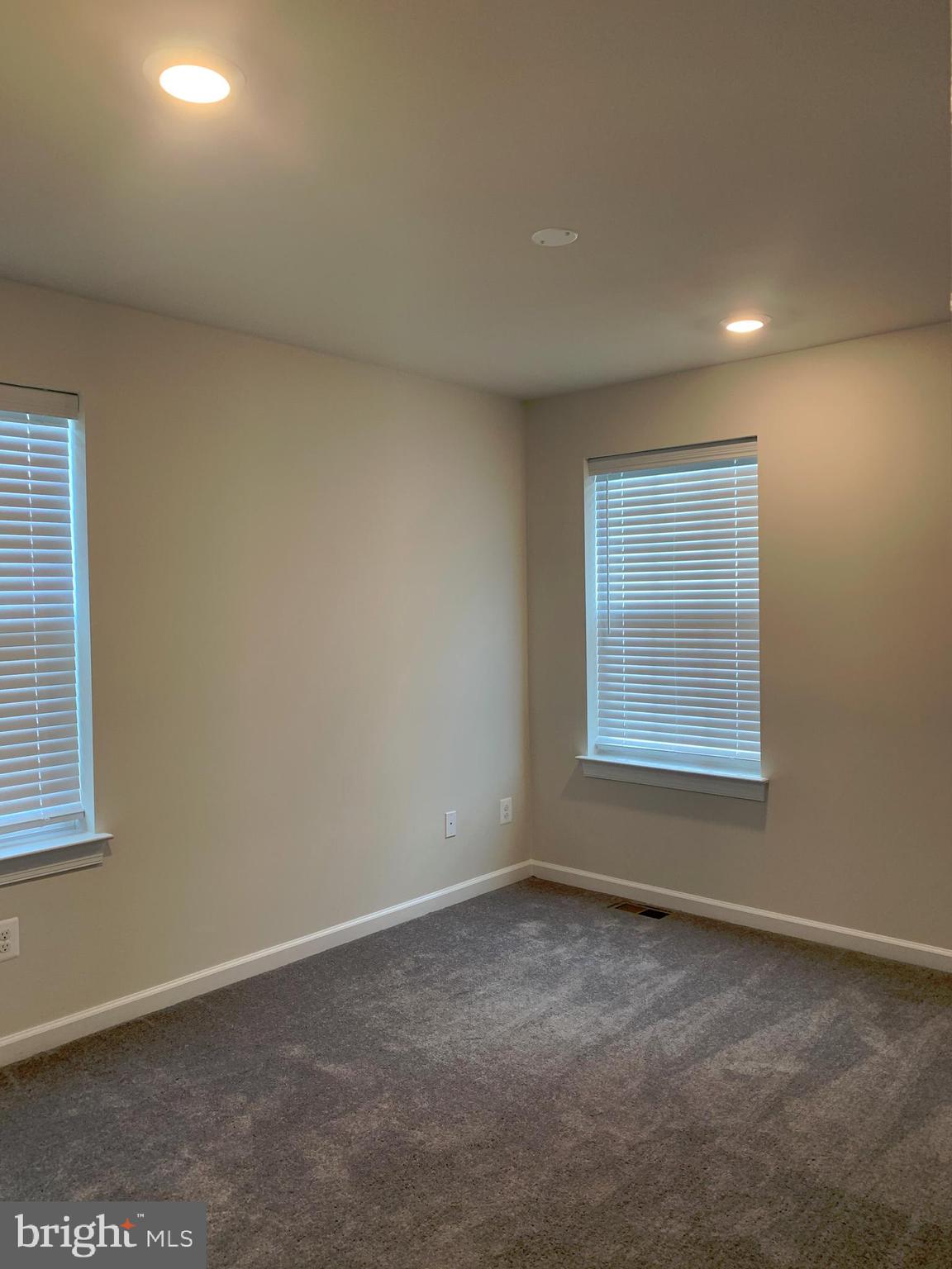 7112 McHenry Mews Frederick, MD 21703 - Photo 20 of 27 an empty room with a window