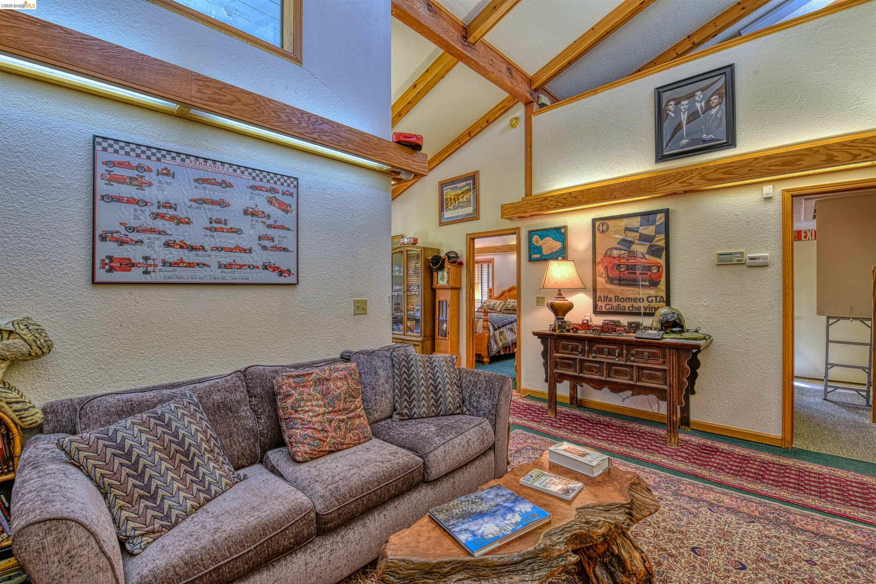 20950 Ferretti Road Groveland, CA 95321 - Photo 15 of 27 a living room with furniture a rug and a window