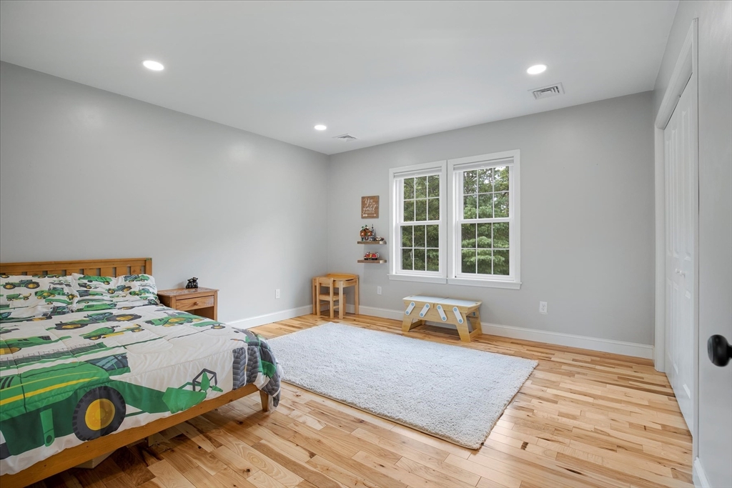 23 Pimlico Pond Road Mashpee, MA 02649 - Photo 20 of 42 a bedroom with a bed and a window