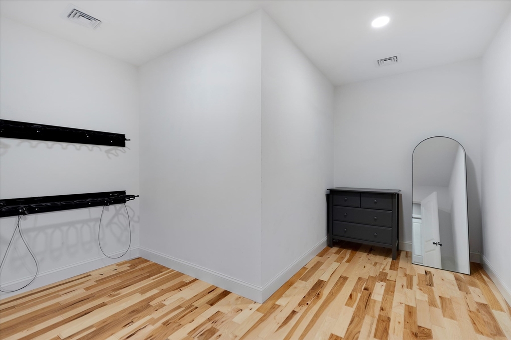 23 Pimlico Pond Road Mashpee, MA 02649 - Photo 26 of 42 a room with a bed and a dresser