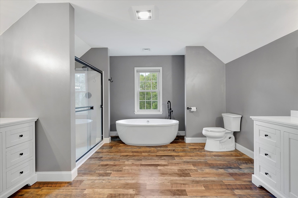 23 Pimlico Pond Road Mashpee, MA 02649 - Photo 27 of 42 a bathroom with a toilet sink and mirror