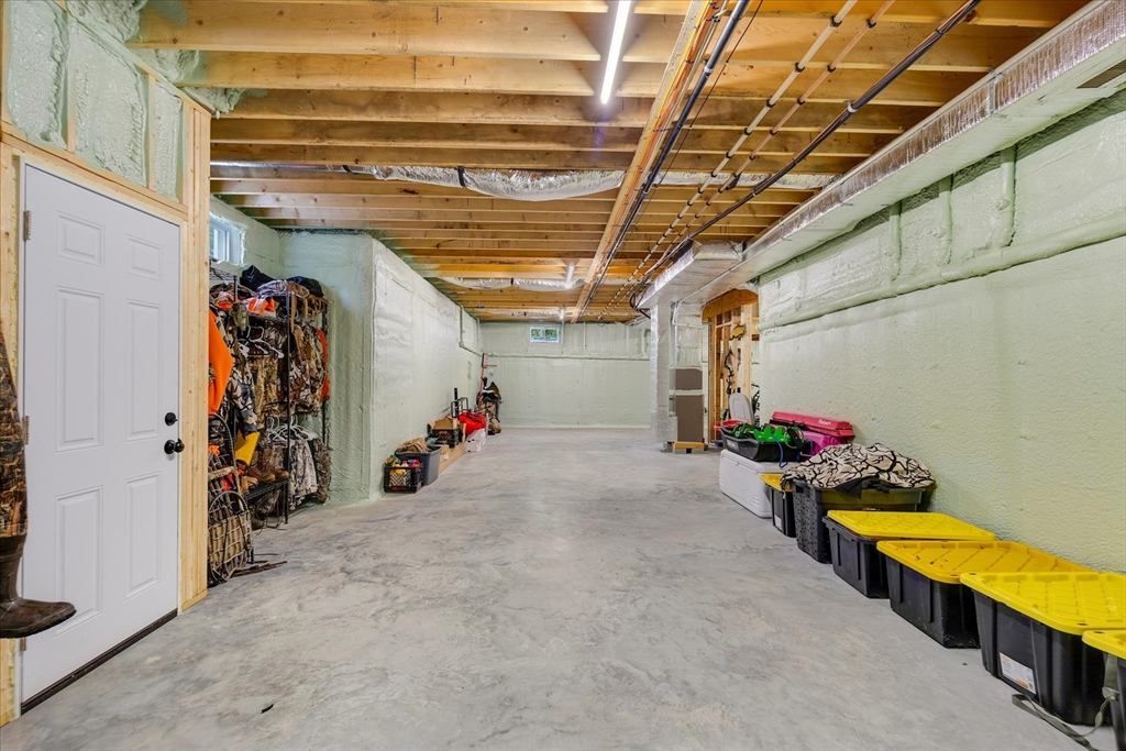 23 Pimlico Pond Road Mashpee, MA 02649 - Photo 35 of 42 a view of a garage with storage