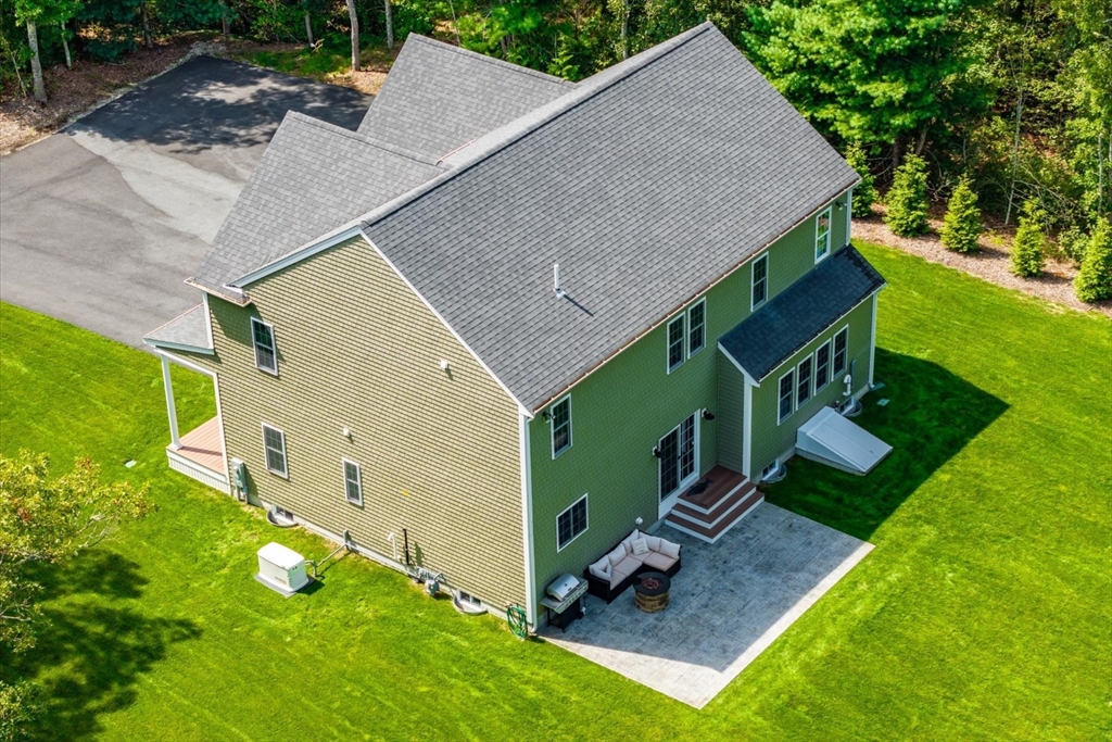 23 Pimlico Pond Road Mashpee, MA 02649 - Photo 41 of 42 a view of an house with a backyard