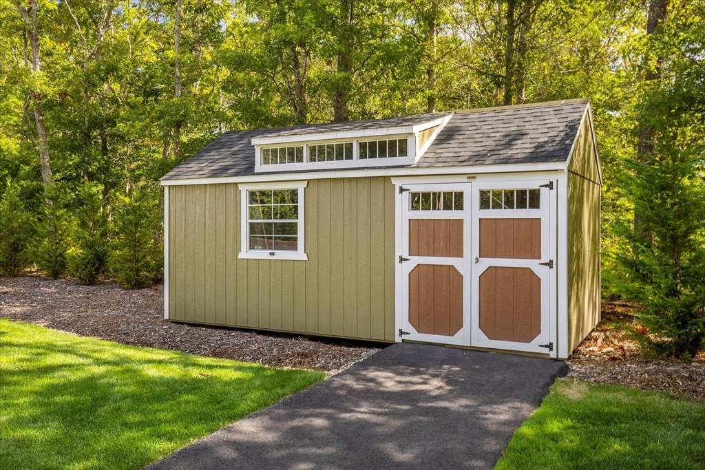 23 Pimlico Pond Road Mashpee, MA 02649 - Photo 42 of 42 a view of a house with backyard and garden