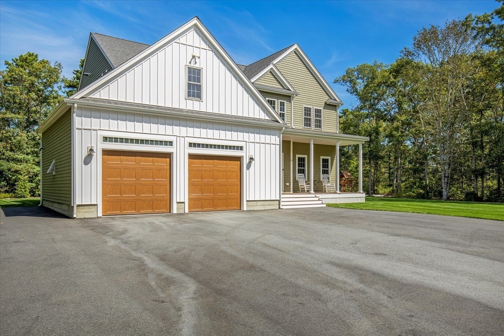 23 Pimlico Pond Road Mashpee, MA 02649 - Photo 7 of 42 a view of yellow house with a big yard and large trees