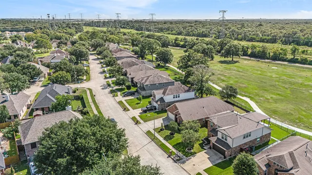 an aerial view of a house with a garden