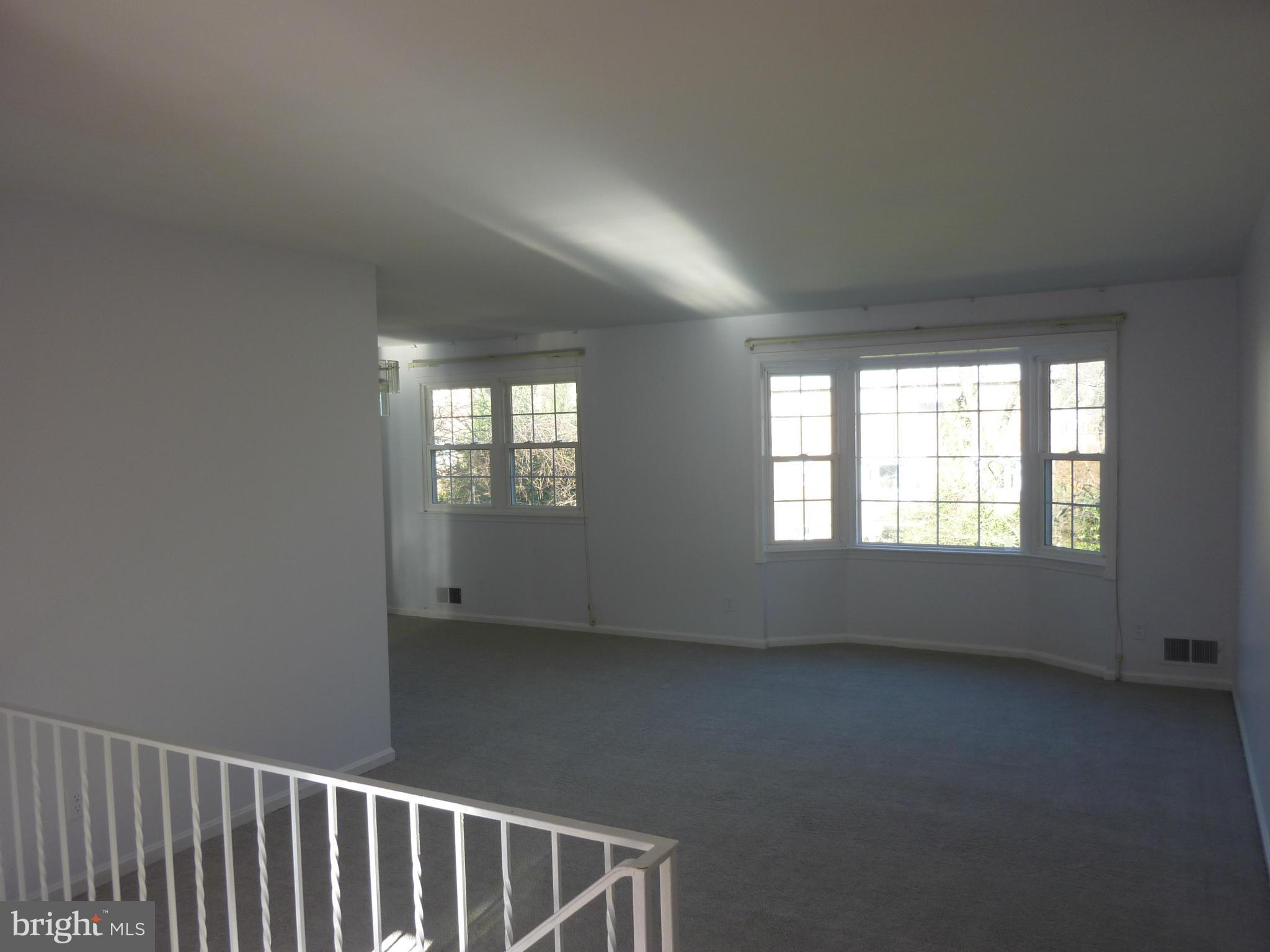 1936 Powder Mill Road Silver Spring, MD 20903 - Photo 4 of 4 a view of an empty room with a window