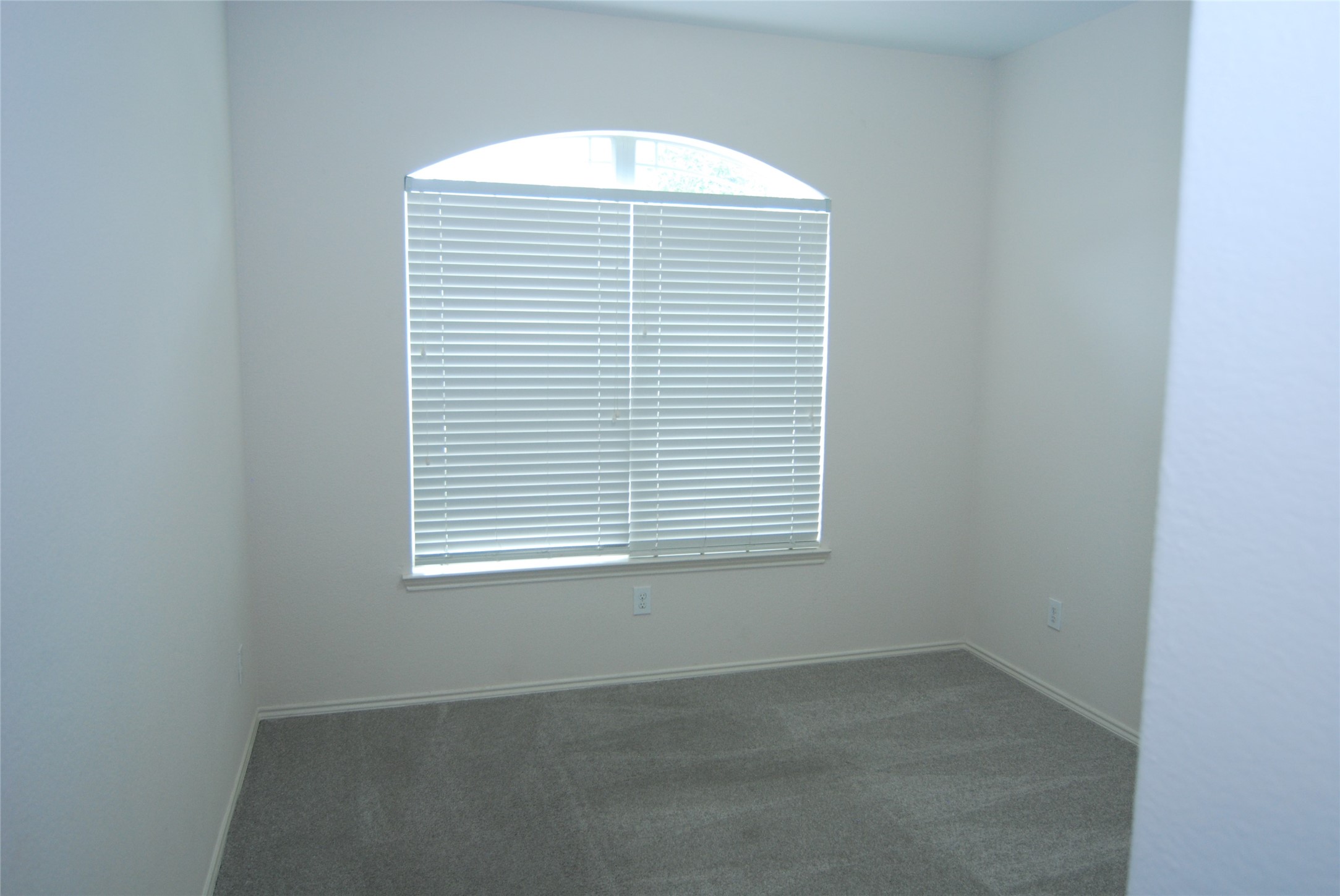 2834 Lockeridge Pines Drive Spring, TX 77386 - Photo 16 of 20 Secondary bedroom 3. This one faces the front yard, would make a nice home office!