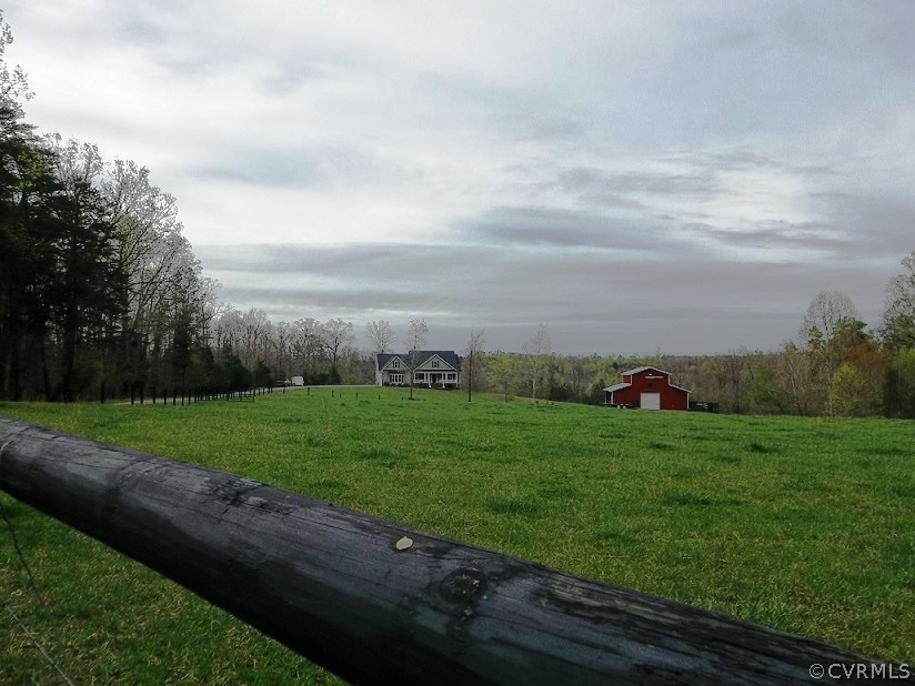1928 Chinquapin Road Prospect, VA 23960 - Photo 1 of 24 a view of a grassy field with trees