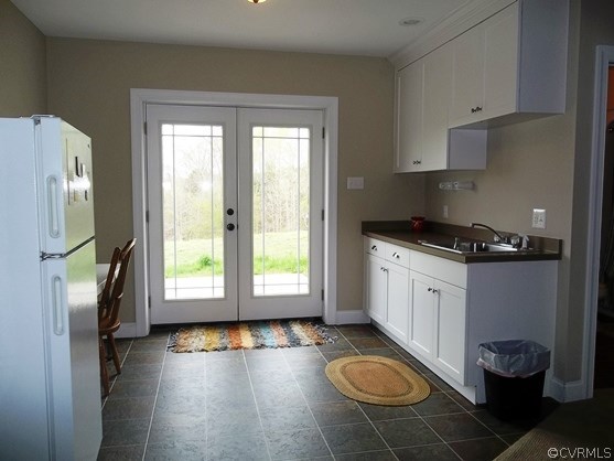 1928 Chinquapin Road Prospect, VA 23960 - Photo 14 of 24 a view of a kitchen with a sink dishwasher and wooden floor