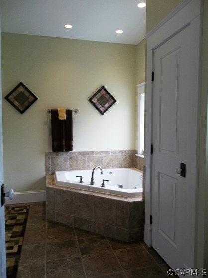 1928 Chinquapin Road Prospect, VA 23960 - Photo 15 of 24 a bathroom with a bathtub and a shower