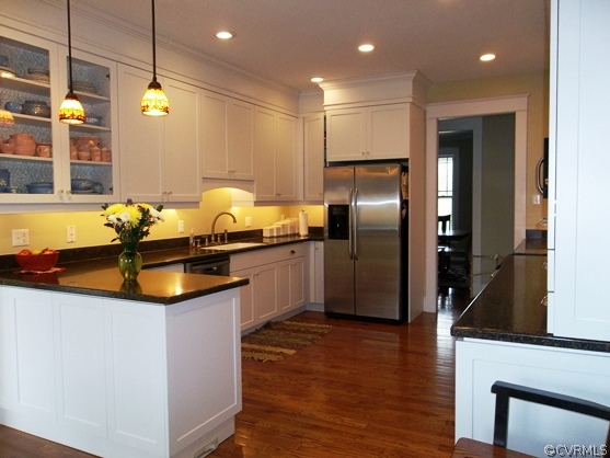 1928 Chinquapin Road Prospect, VA 23960 - Photo 2 of 24 a kitchen with granite countertop a sink and a refrigerator