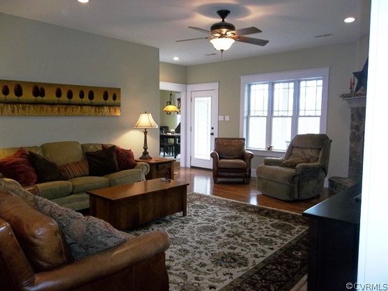 1928 Chinquapin Road Prospect, VA 23960 - Photo 4 of 24 a living room with furniture ceiling fan and a rug