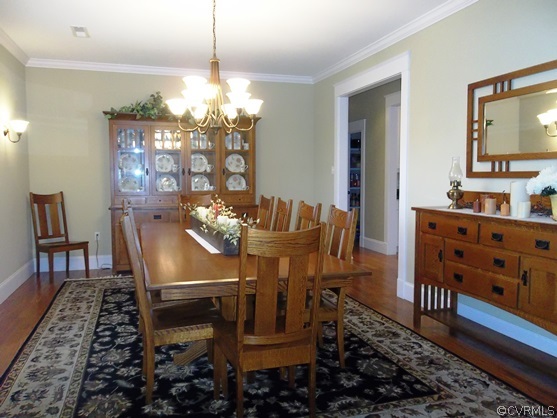 1928 Chinquapin Road Prospect, VA 23960 - Photo 5 of 24 a view of a dining room with furniture and chandelier