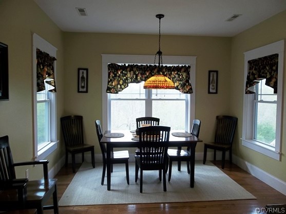 1928 Chinquapin Road Prospect, VA 23960 - Photo 8 of 24 a view of a dining room with furniture window and wooden floor