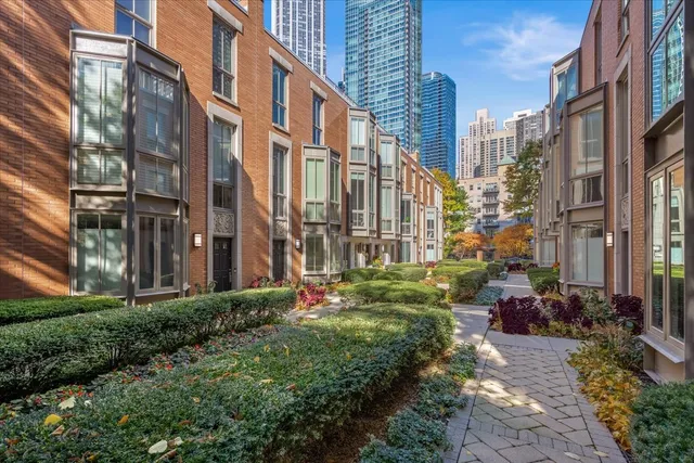 a view of a building both side of the street