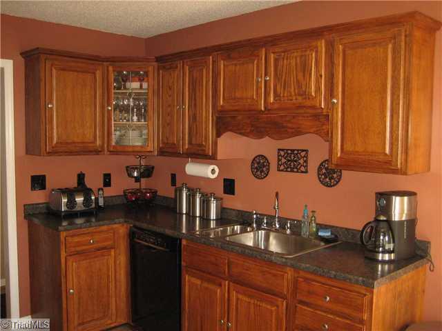 210 Stapleton Way High Point, NC 27265 - Photo 3 of 16 Kitchen. Nicely refinished oak cabinets.