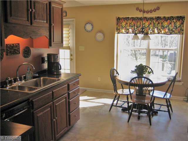 210 Stapleton Way High Point, NC 27265 - Photo 4 of 16 Breakfast. Breakfast room with a view of the patio.