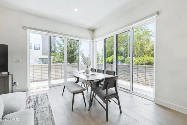 a view of a livingroom with furniture and wooden floor