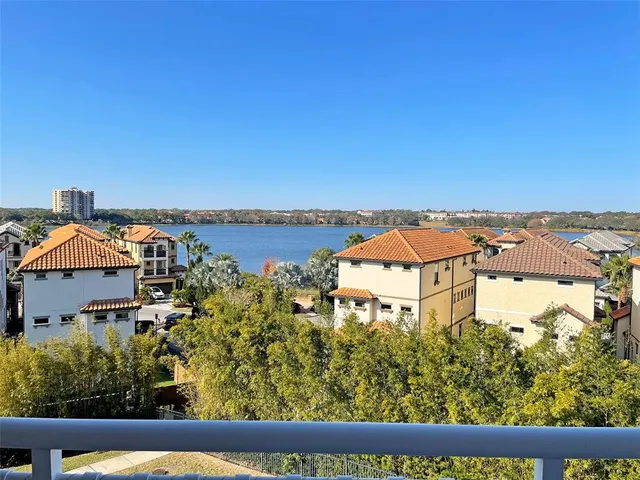 view of a city with an ocean