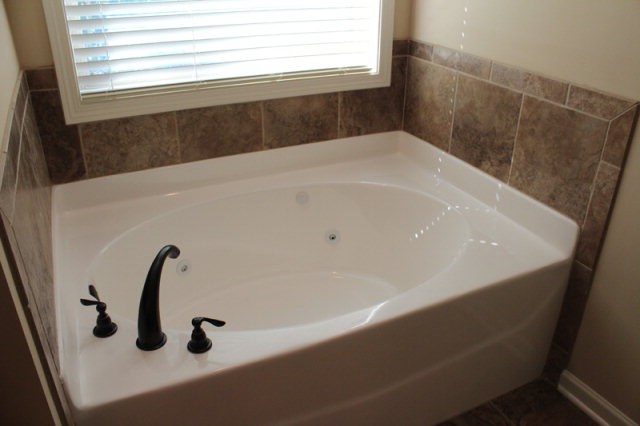 9300 Yarbrough Road Midland, GA 31820 - Photo 13 of 18 a bathroom with a bathtub