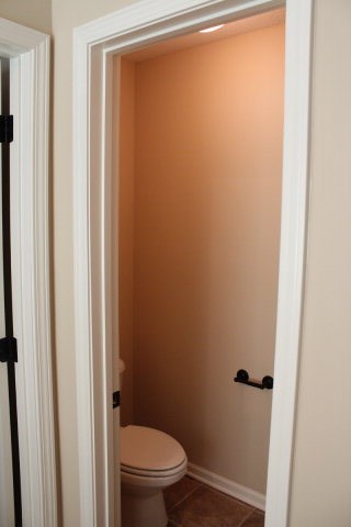 9300 Yarbrough Road Midland, GA 31820 - Photo 14 of 18 a white toilet sitting next to a shower