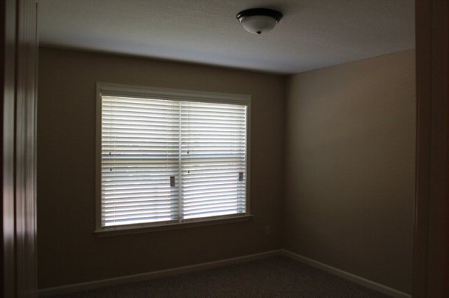 9300 Yarbrough Road Midland, GA 31820 - Photo 16 of 18 an empty room with a window