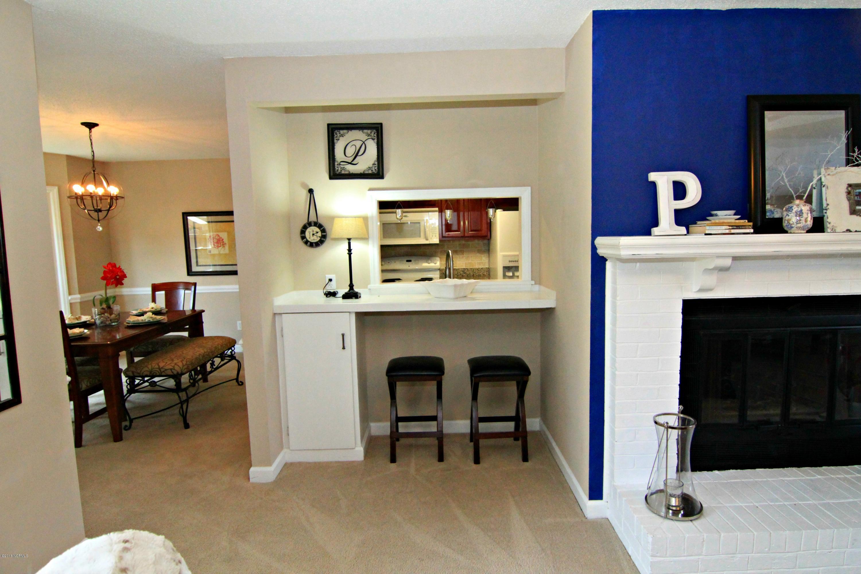 1918 Quail Ridge Road, Unit R Greenville, NC 27858 - Photo 8 of 15 Kitchen Cutout with Bar