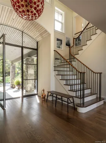 a view of entryway with wooden floor