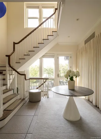 a dining room with large window