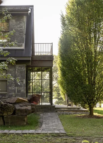 a view of swimming pool from a lake