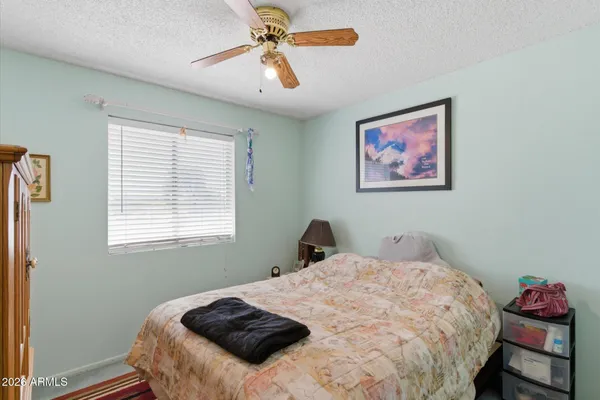 a work room with furniture and a window