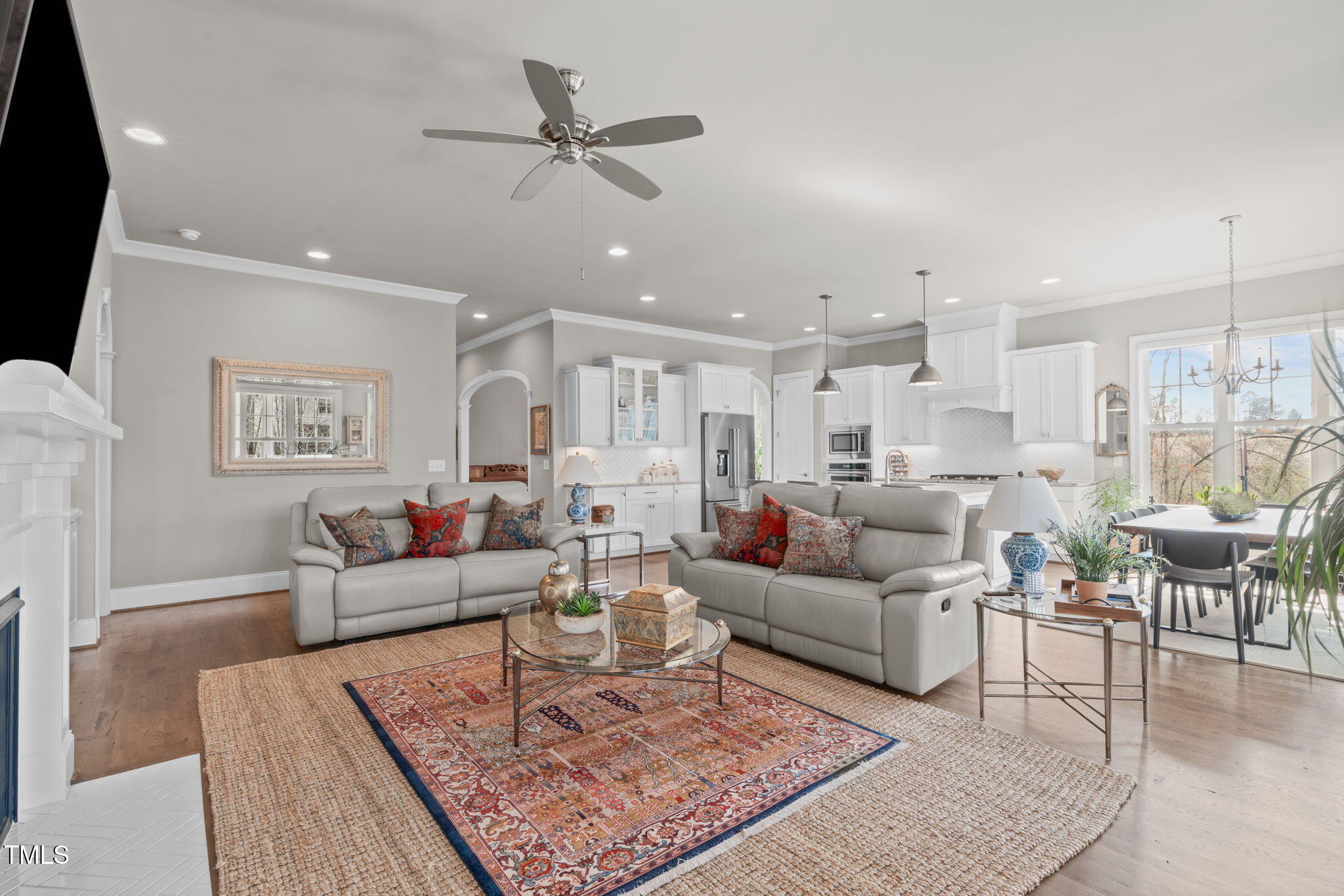 2826 Walden Road Apex, NC 27502 - Photo 14 of 50 a living room with furniture and a rug