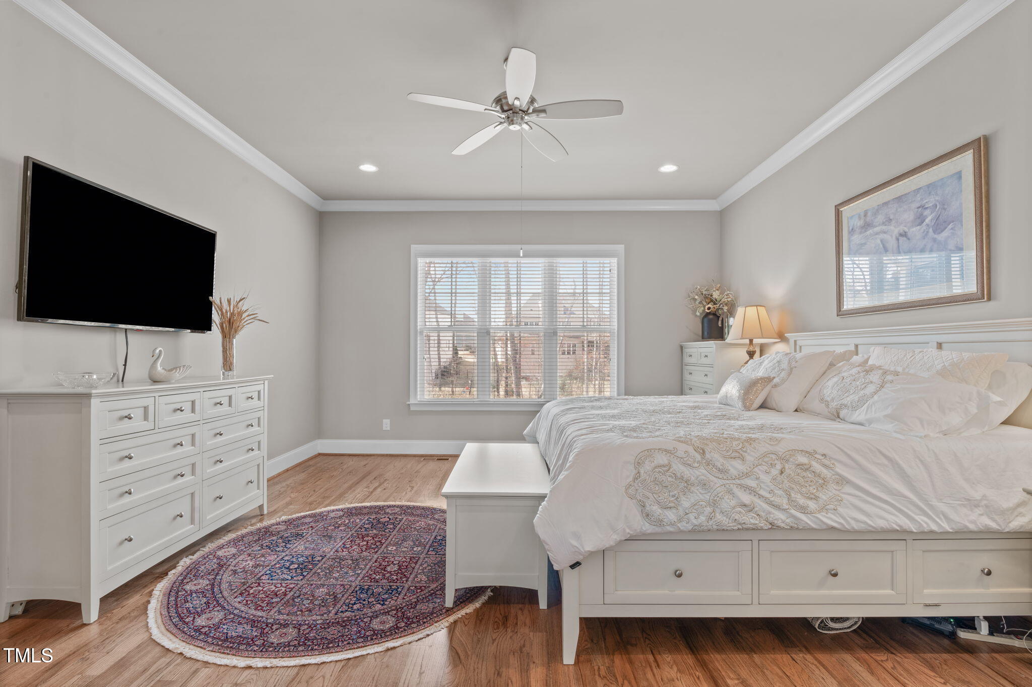 2826 Walden Road Apex, NC 27502 - Photo 23 of 50 a bedroom with a bed a window and television