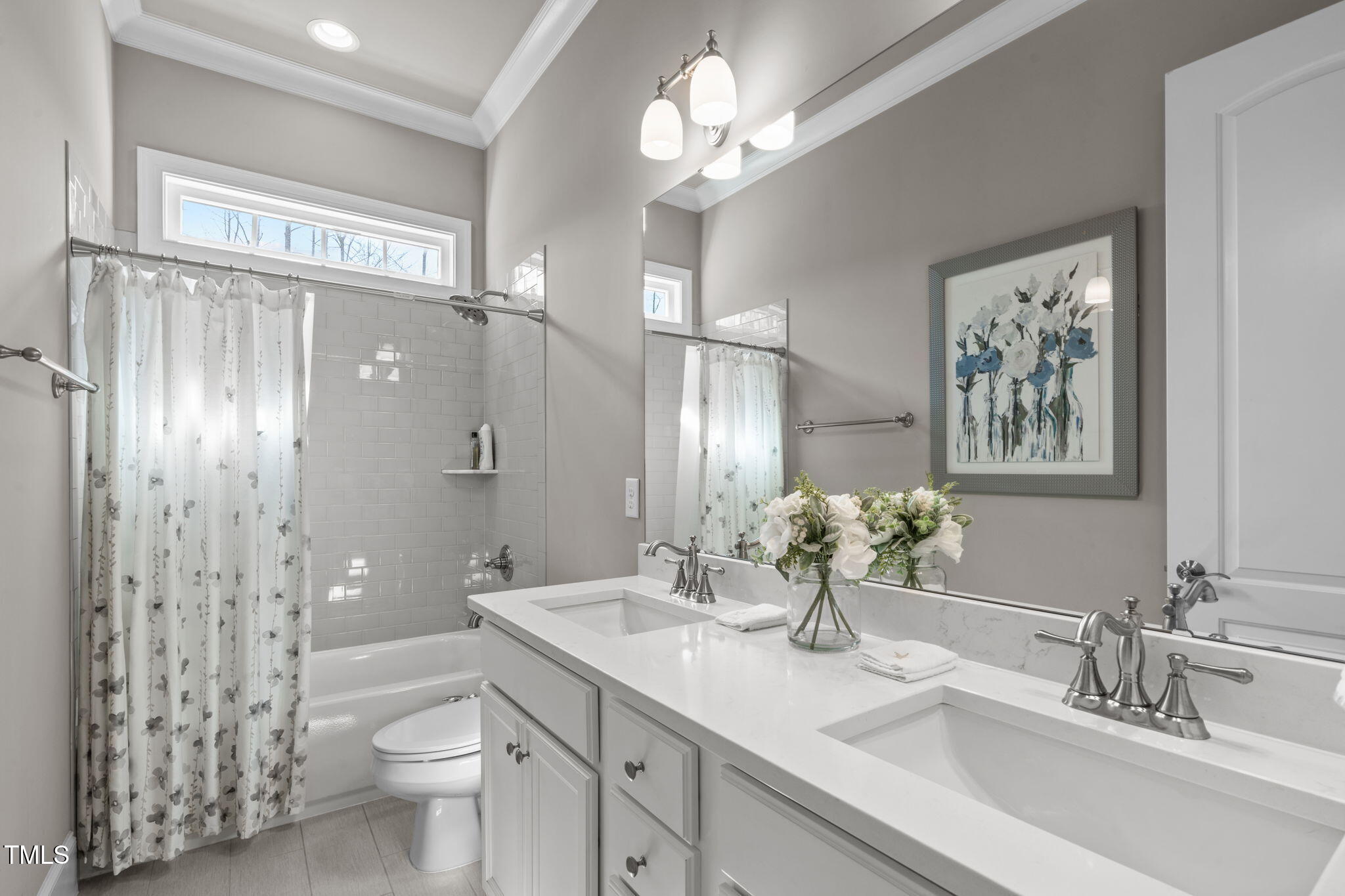 2826 Walden Road Apex, NC 27502 - Photo 30 of 50 a bathroom with double vanity sinks a toilet a shower and a mirror