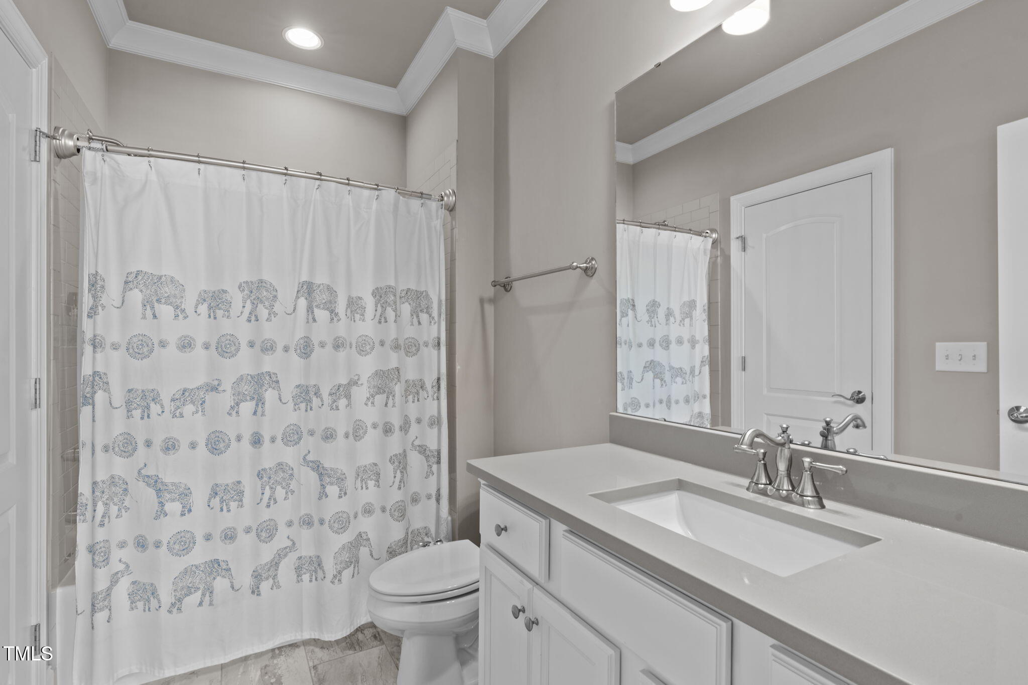 2826 Walden Road Apex, NC 27502 - Photo 42 of 50 a bathroom with a granite countertop sink a toilet and a mirror