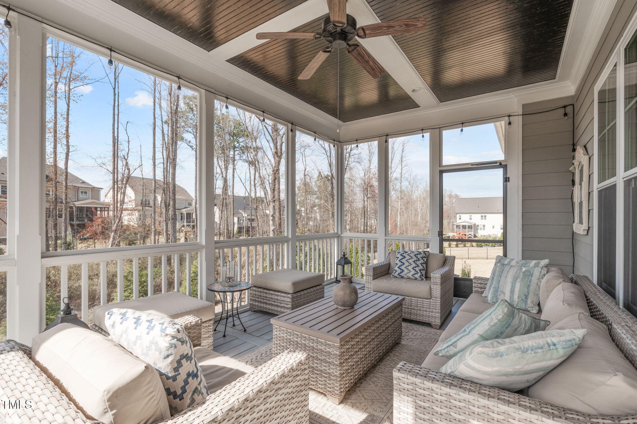 2826 Walden Road Apex, NC 27502 - Photo 43 of 50 a living room with furniture and floor to ceiling windows