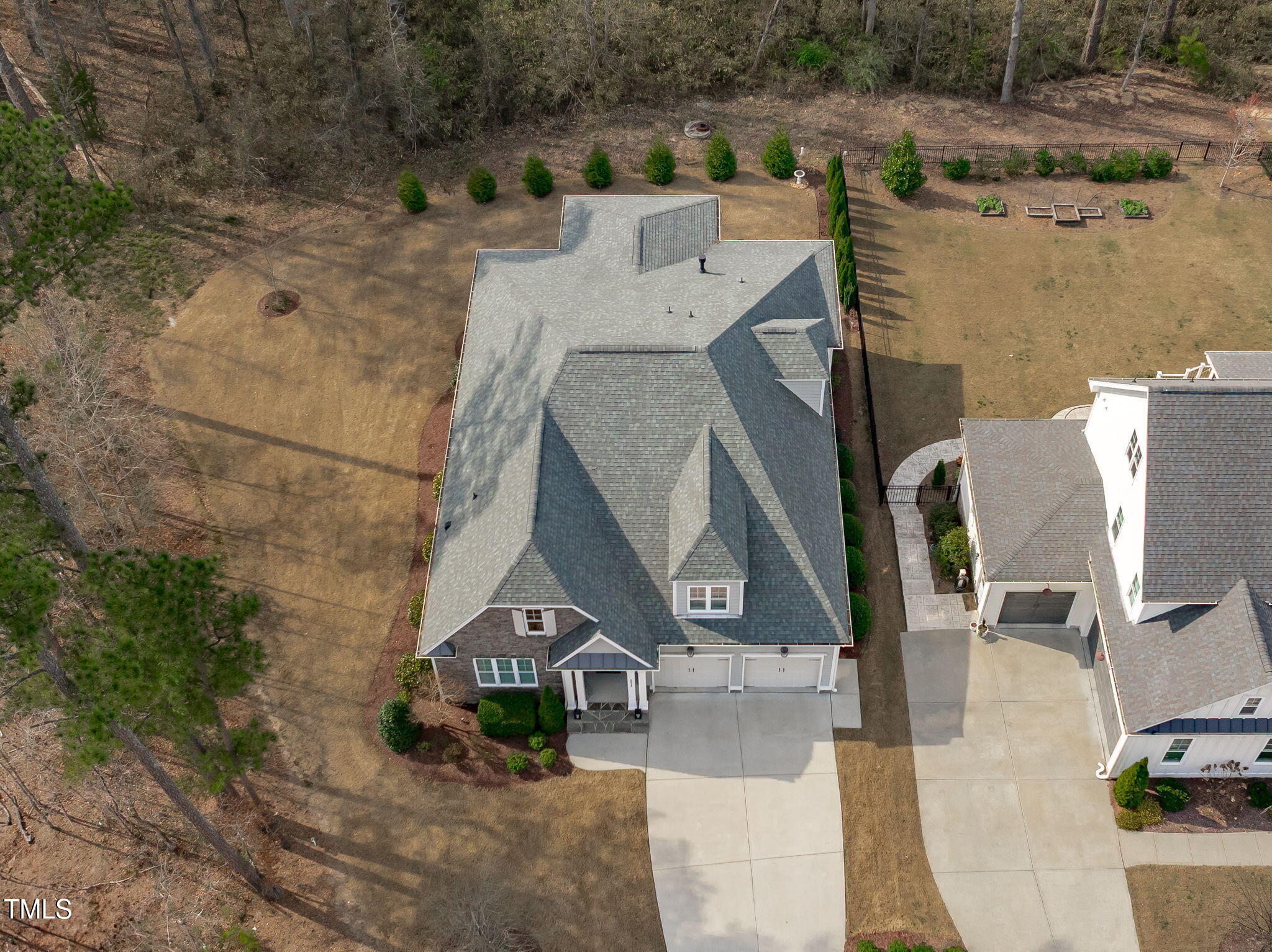 2826 Walden Road Apex, NC 27502 - Photo 50 of 50 an aerial view of a house with a yard