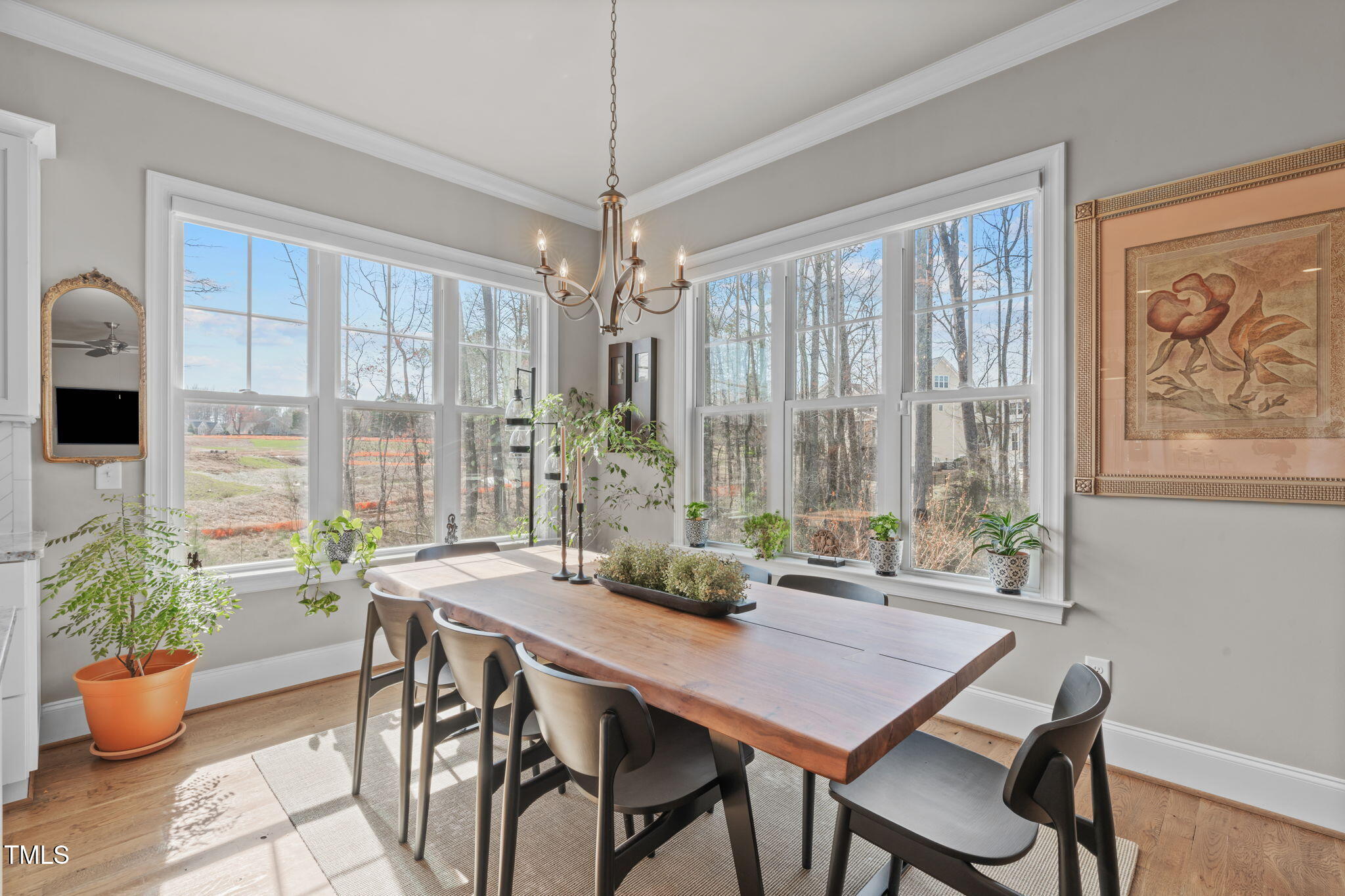 2826 Walden Road Apex, NC 27502 - Photo 10 of 50 a dining room with furniture window and wooden floor