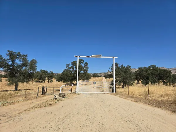 a view of a house with a snow on the road
