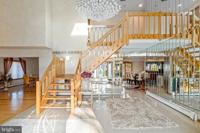 a view of an entryway with wooden floor