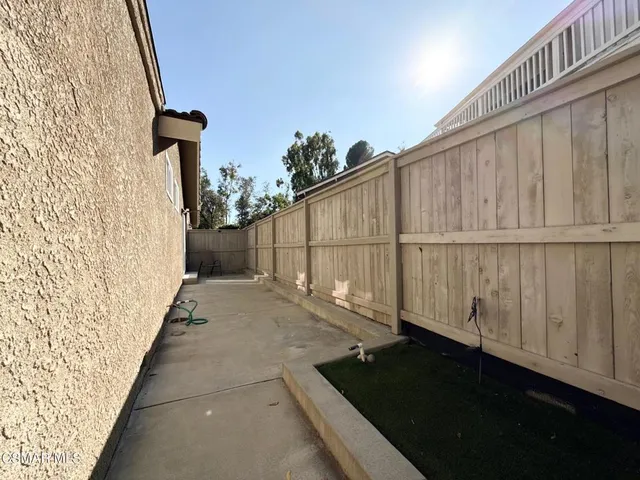 a view of a utility room with wooden floor