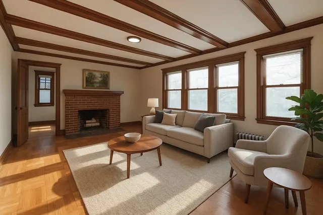 a living room with furniture a rug and a fireplace