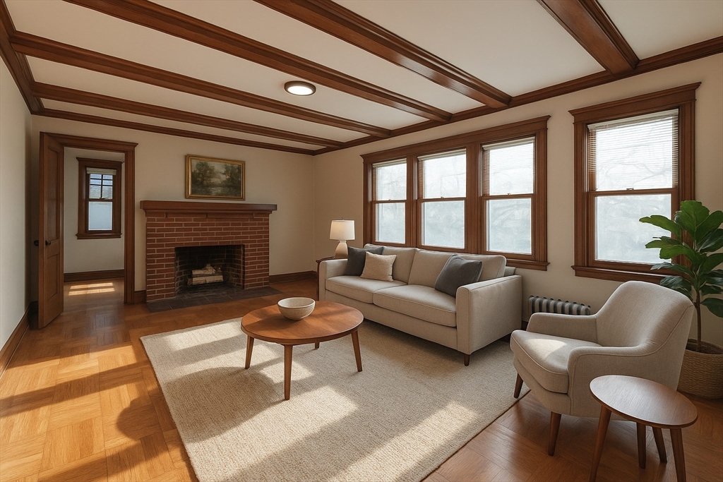 a living room with furniture a rug and a fireplace