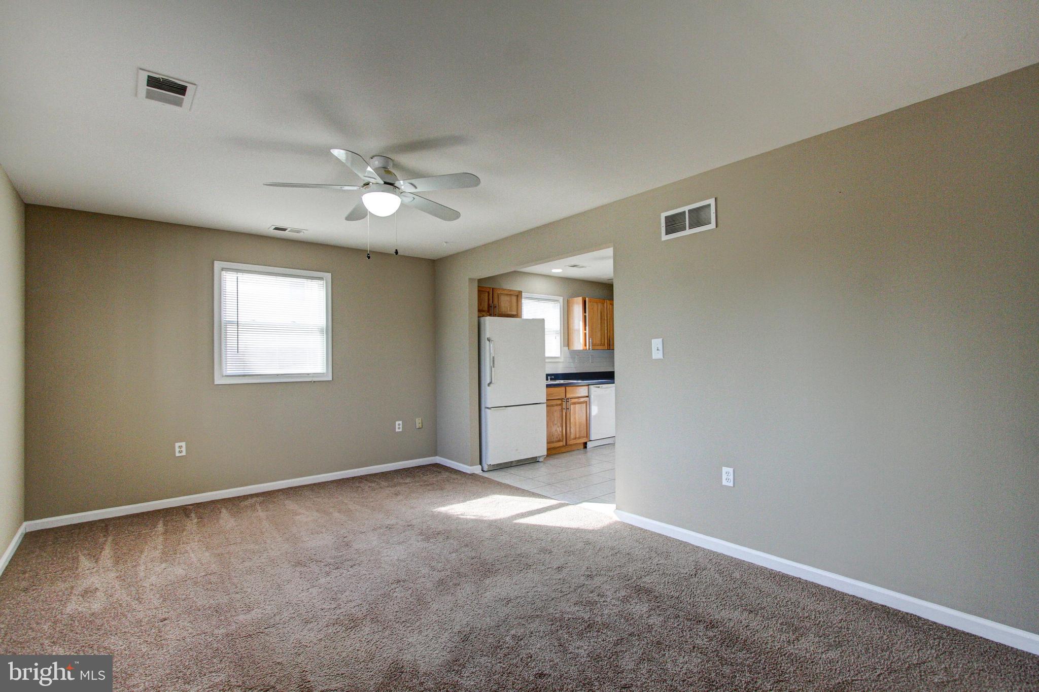 115 Andover Road Fairless Hills, PA 19030 - Photo 5 of 19 Spacious Living Room leads to kitchen