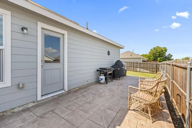 a view of a terrace with chairs