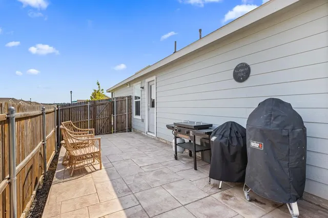 a view of a chairs in patio