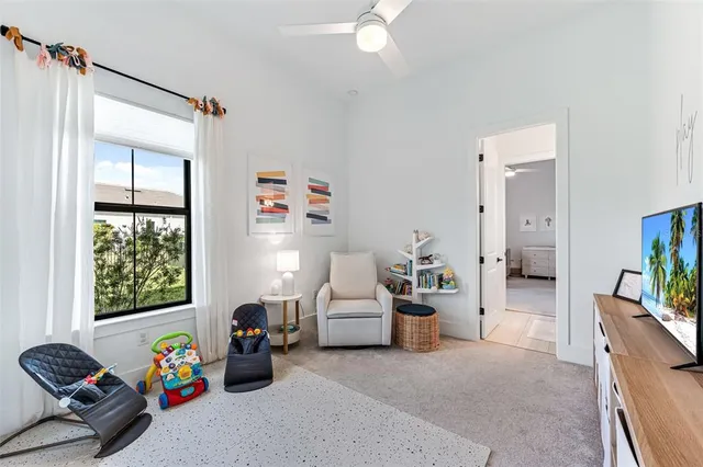 a bathroom with a sink double vanity mirror and a bathtub