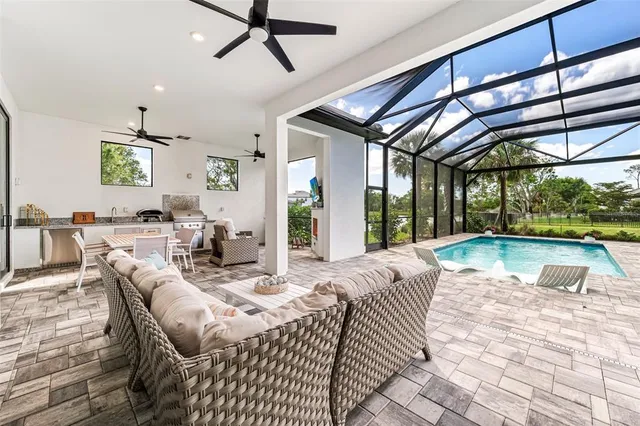 a view of swimming pool with a patio