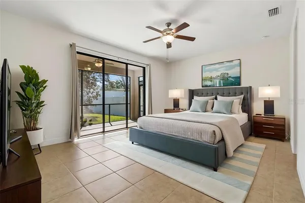 a view of an empty room with a ceiling fan